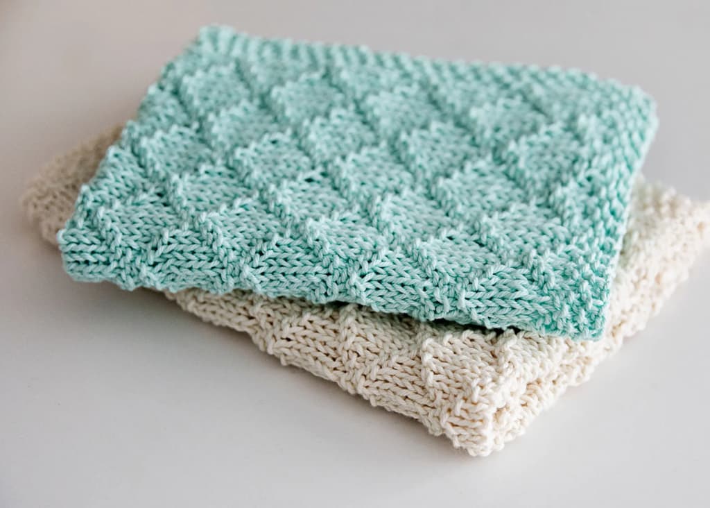 Knitted towels in beige and blue colors